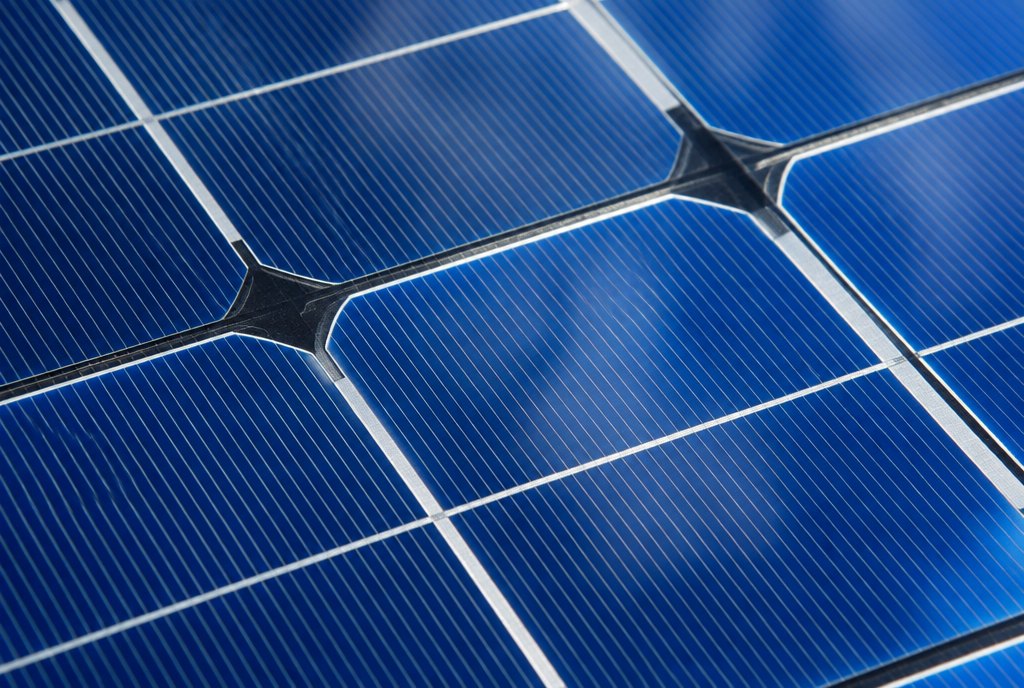 macro close-up of blue monocrystalline solar cells with silver contact lines macro close-up of blue monocrystalline solar cells with silver contact lines